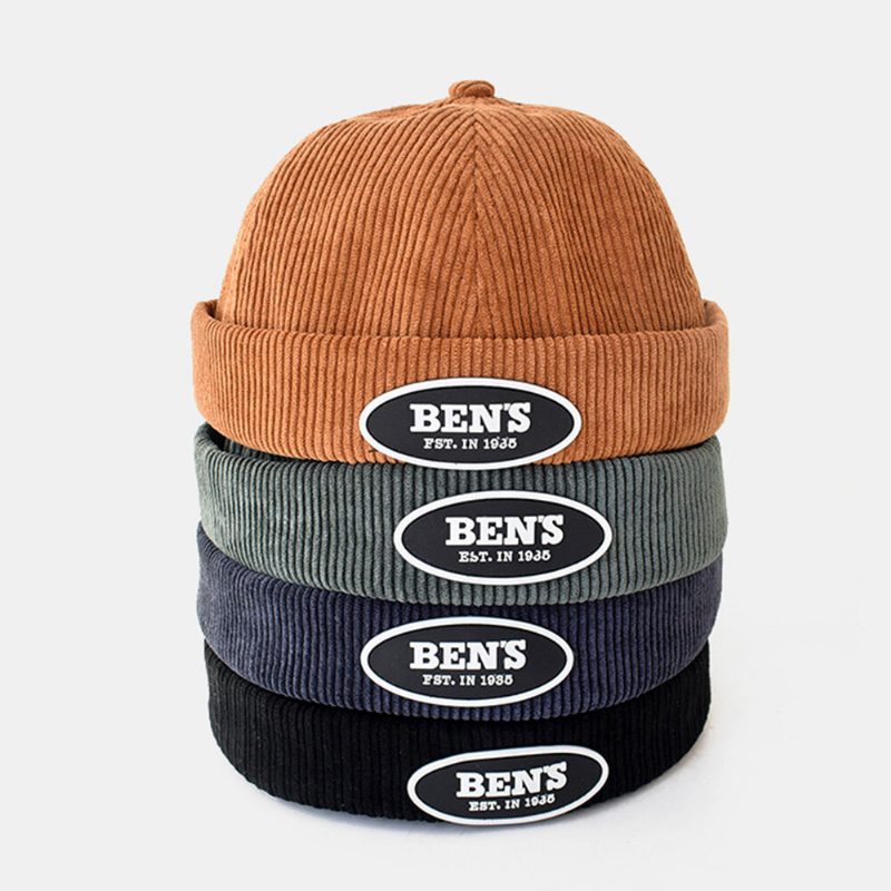 Menn Landeier Cap Corduroy Bokstaver Oval Etikett All-match Justerbar Brimless Beanie Skull Cap For Kvinner